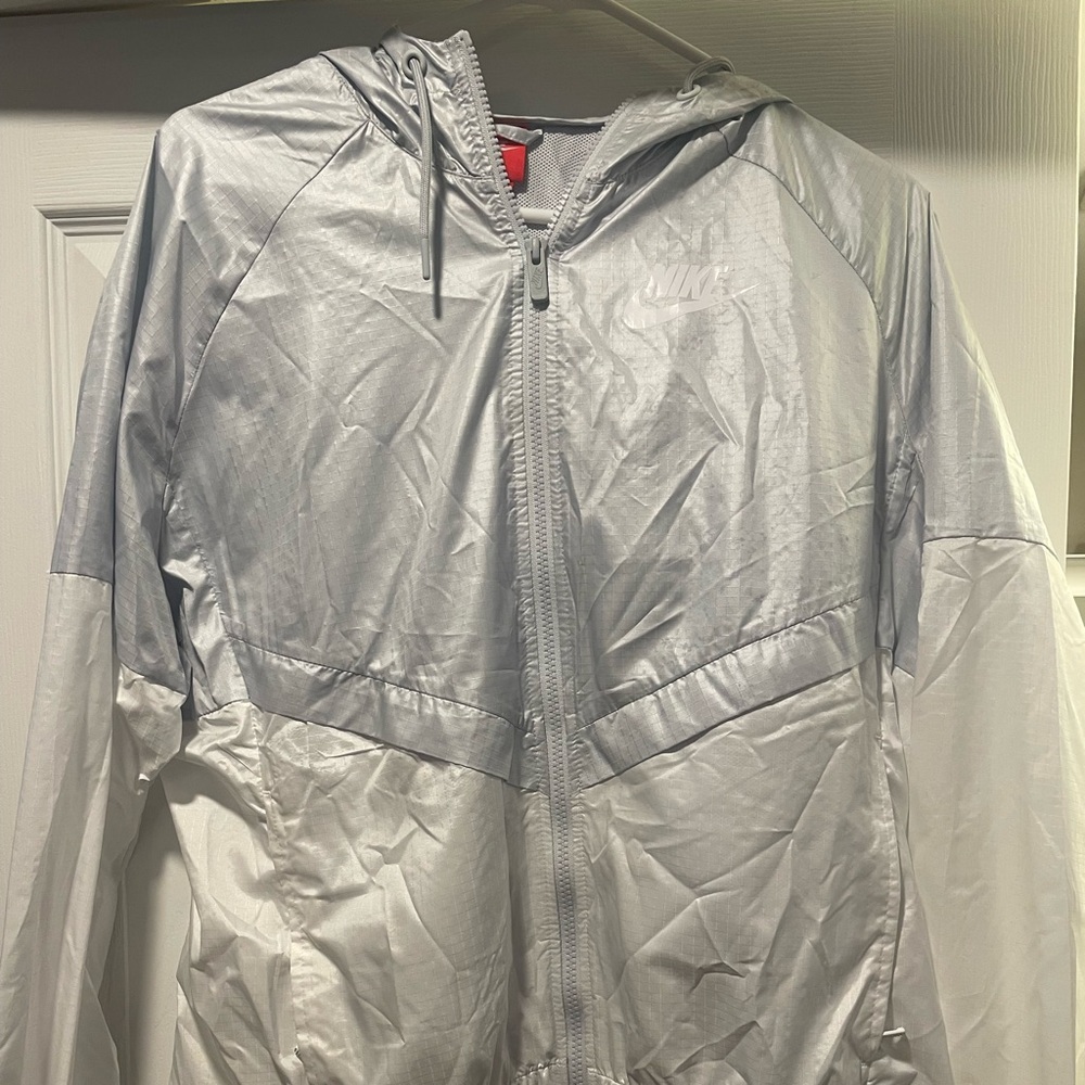 Nike large windbreaker with hoodie.